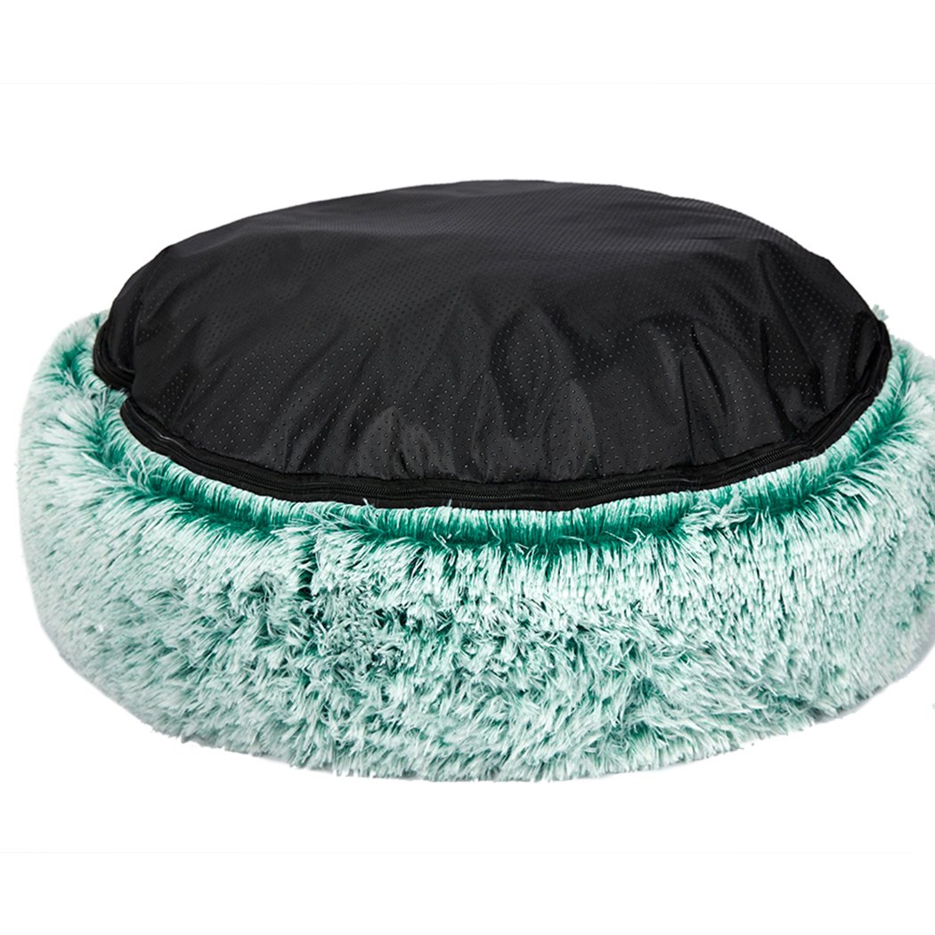 Teal XL donut-shaped pet bed with plush surface and raised rim, designed for dogs and cats to provide comfort and security.