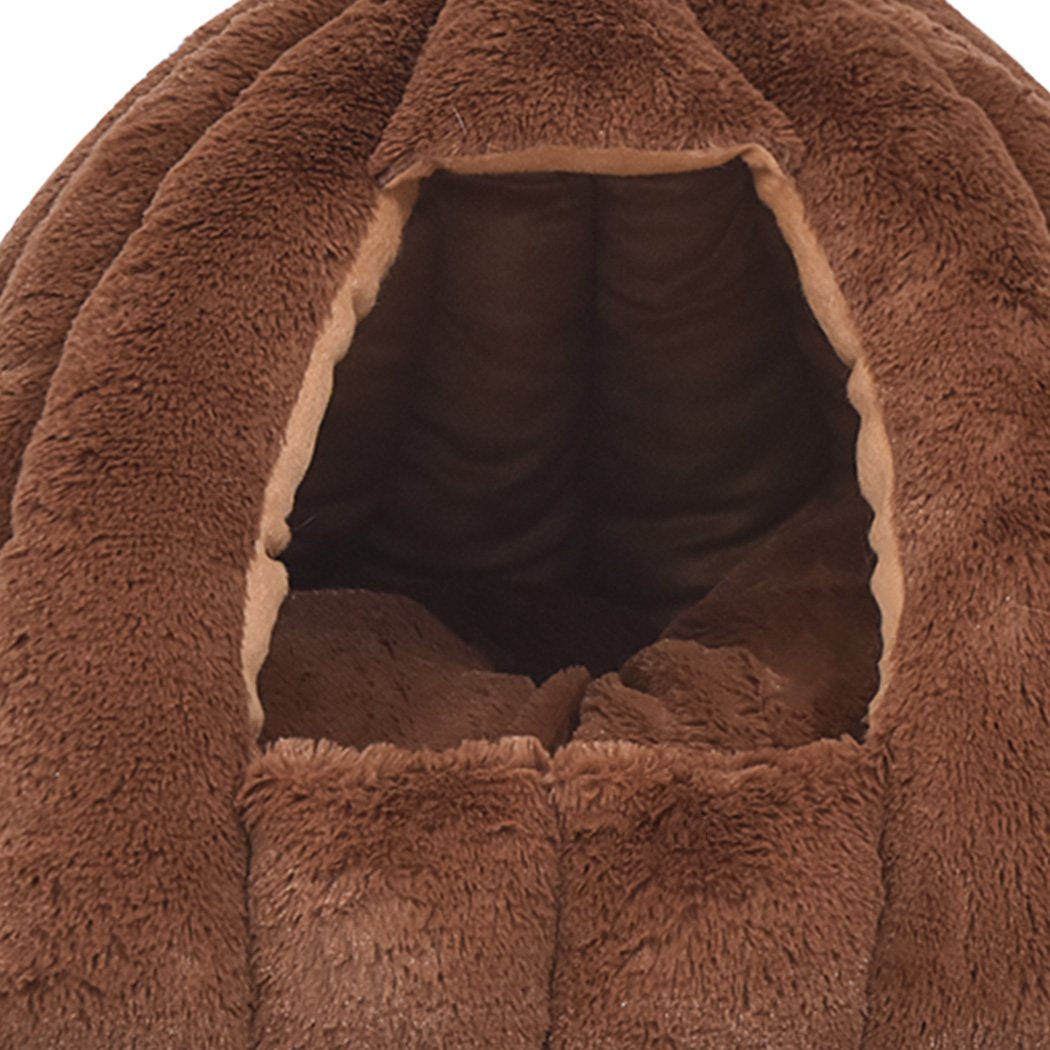 Brown Comfy Kennel Cave Pet Bed designed for cats and dogs, featuring a pumpkin house design and soft flannel material for warmth.