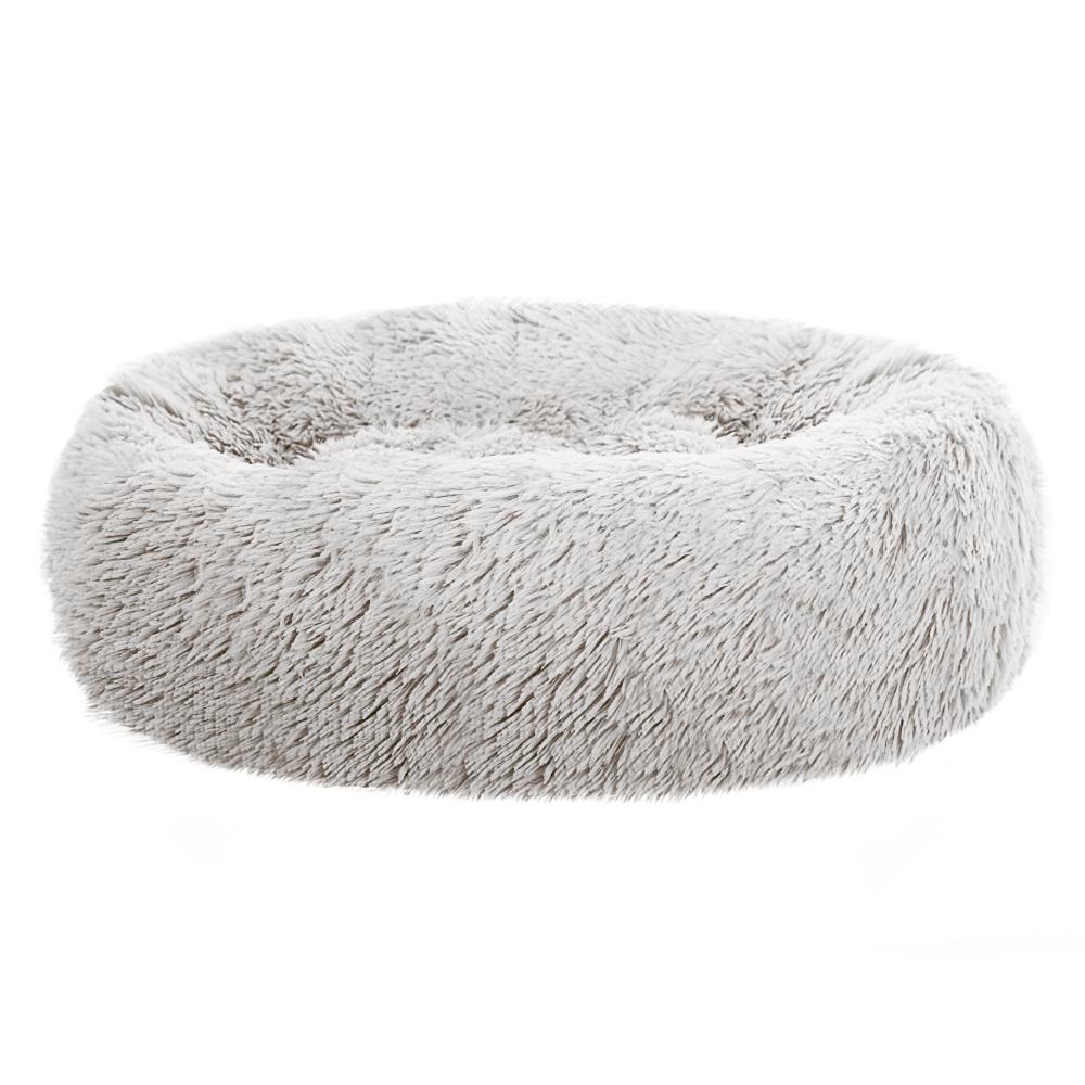 Medium-sized white pet bed with brown accents, designed for dogs and cats, featuring a soft surface and non-slip base.