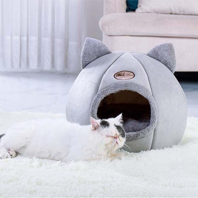 Cozy plush cat house with removable mat, perfect for winter warmth and indoor use.