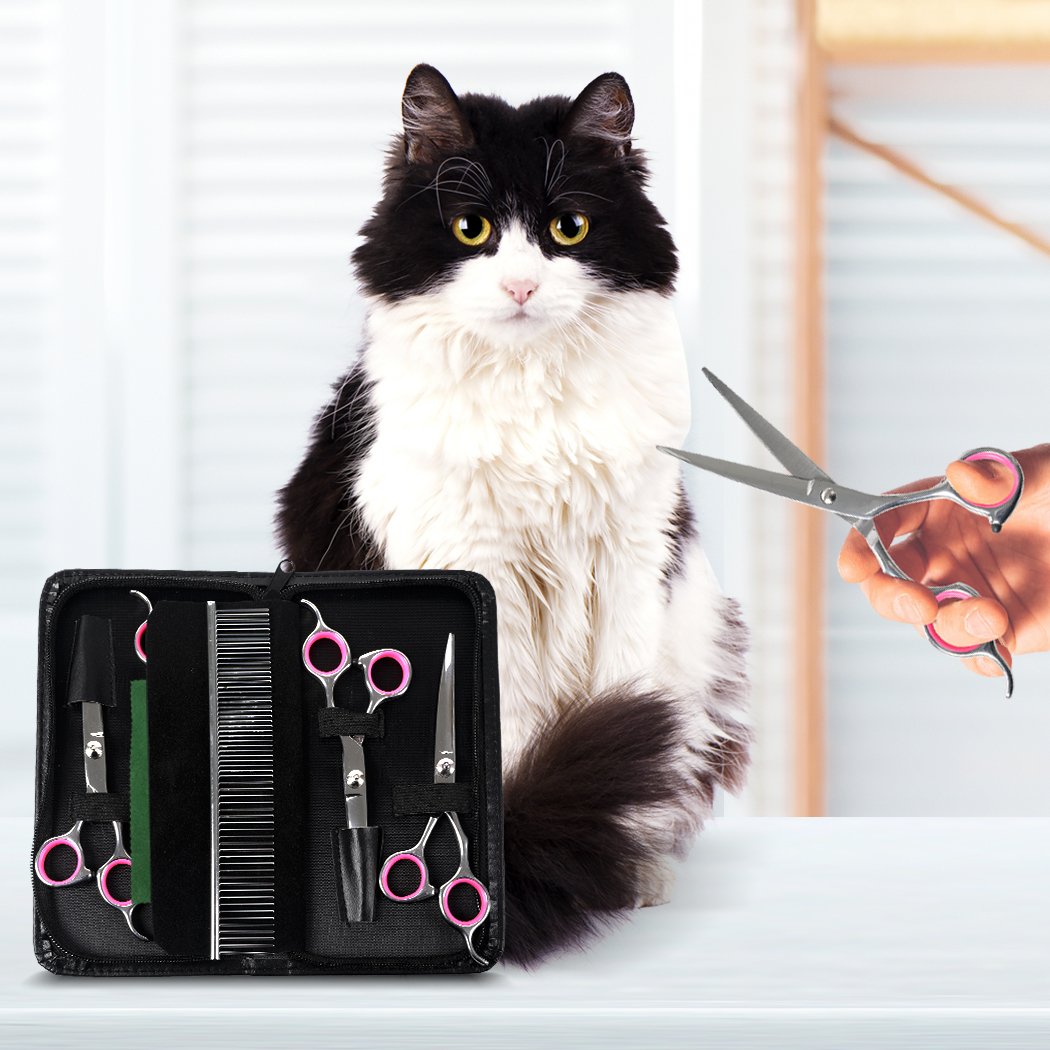 A professional pet grooming scissors set featuring four types of scissors, a comb, and a cloth, all housed in a stylish PU leather pouch.