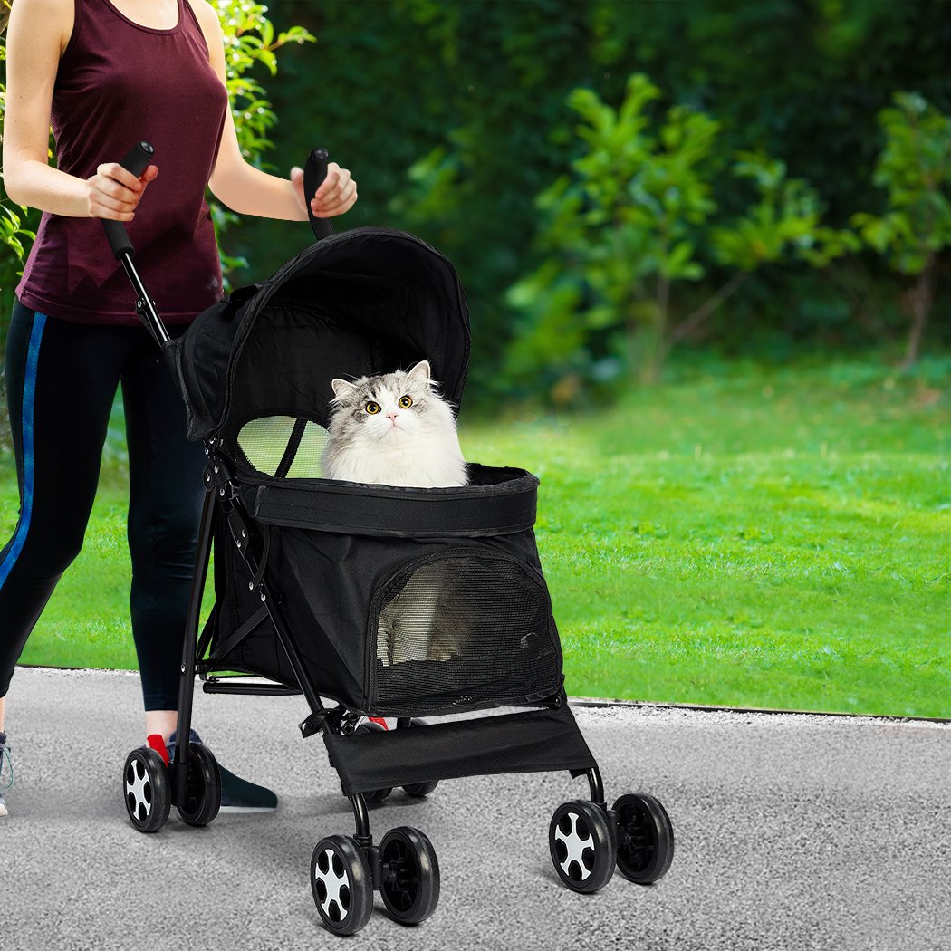 Foldable pet stroller for dogs and cats with a sturdy steel frame and breathable canopy, designed for comfortable travel.