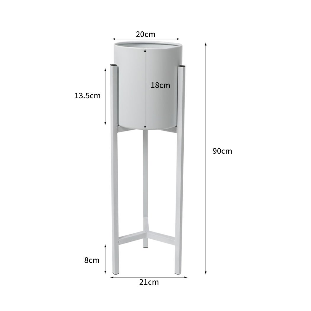 Elegant metal plant stand with a detachable pot, perfect for showcasing plants indoors and outdoors.