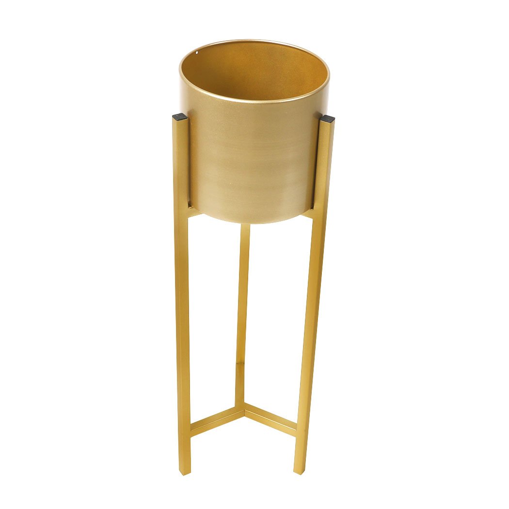 Elegant metal plant stand with a gold finish, showcasing a beautiful flower pot, perfect for home and garden decor.