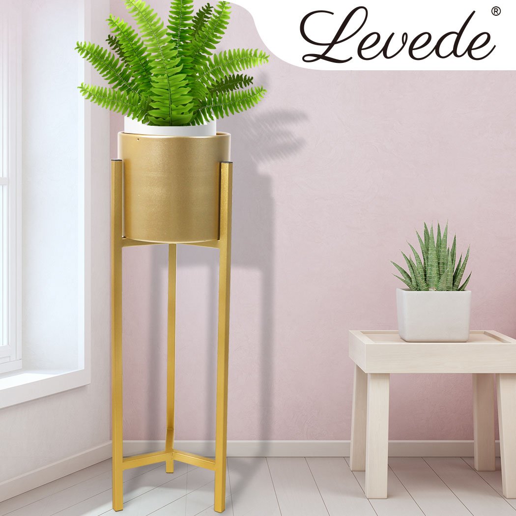 Elegant metal plant stand with a gold finish, showcasing a beautiful flower pot, perfect for home and garden decor.