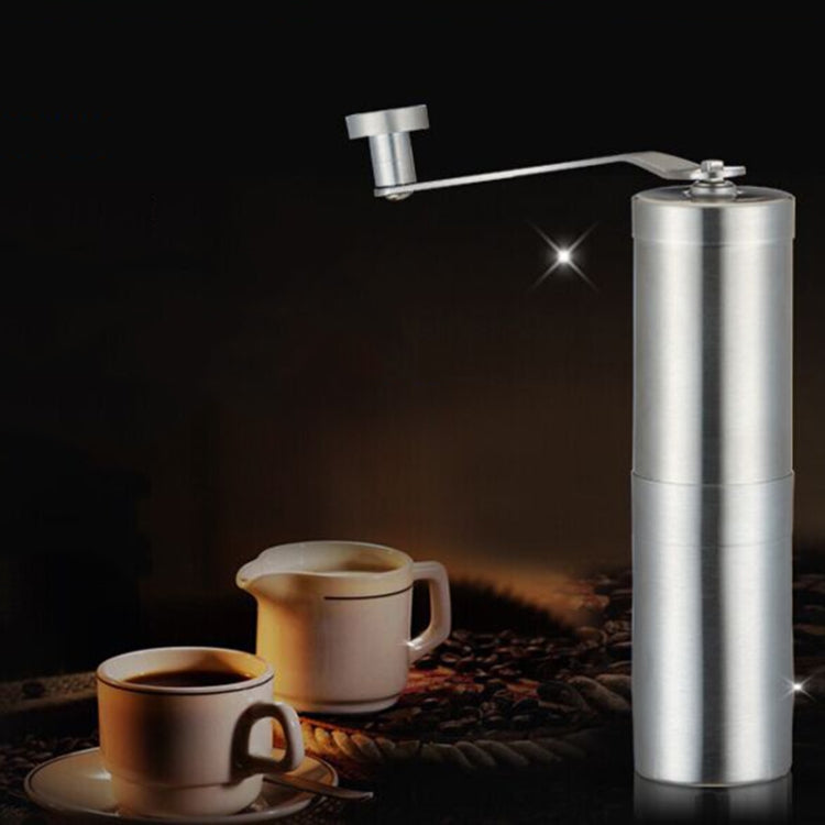 Portable Conical Burr Mill Manual Stainless Steel Grinder for Coffee Beans and Spices, compact and durable design.