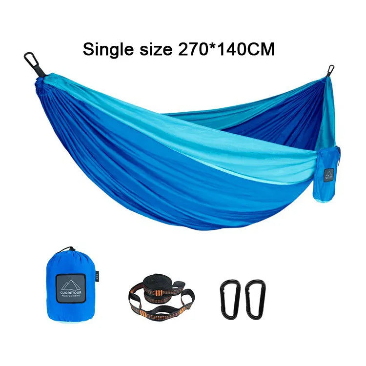 Portable Nylon Parachute Fabric Hammock in outdoor setting, showcasing its lightweight and comfortable design.