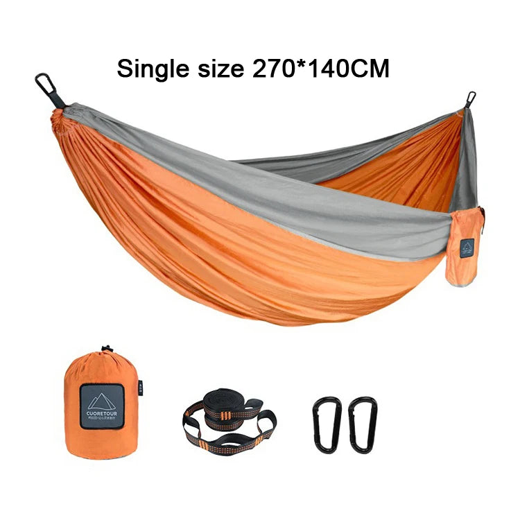 Portable Nylon Parachute Fabric Hammock in outdoor setting, showcasing its lightweight and comfortable design.