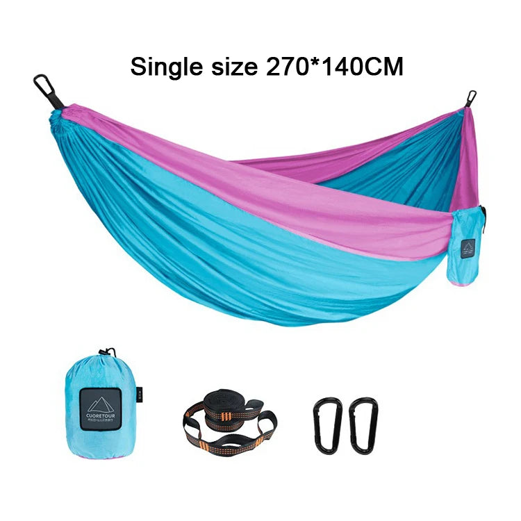 Portable Nylon Parachute Fabric Hammock in outdoor setting, showcasing its lightweight and comfortable design.