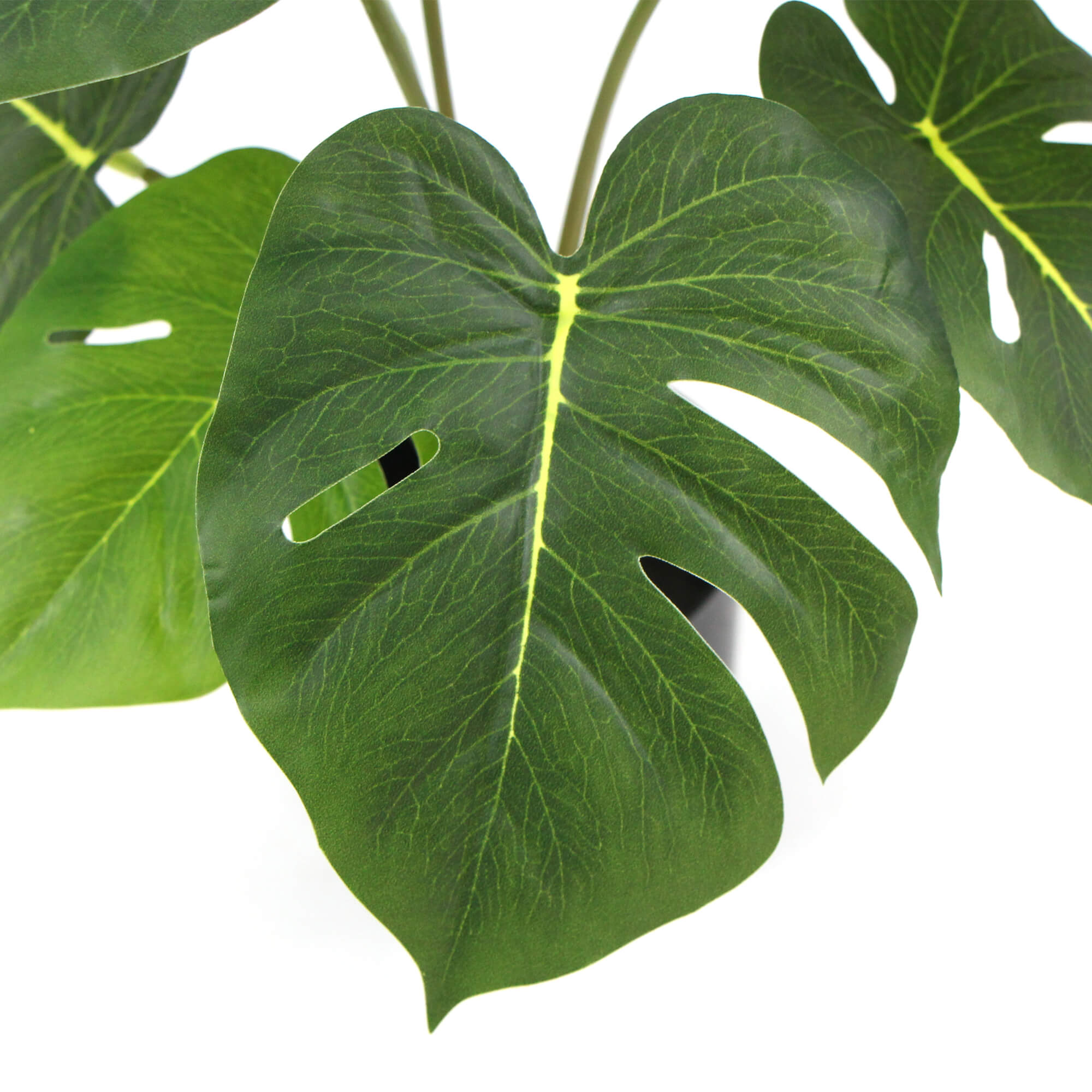 Potted Artificial Split Philodendron Plant with realistic green leaves in a stylish white pot, measuring 35cm tall.