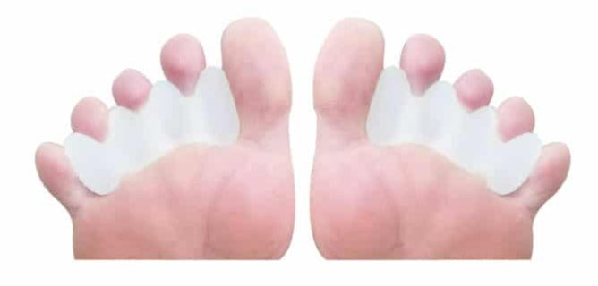 A pair of Premium Toe Spacers made from soft silicone gel, designed for toe alignment and comfort.