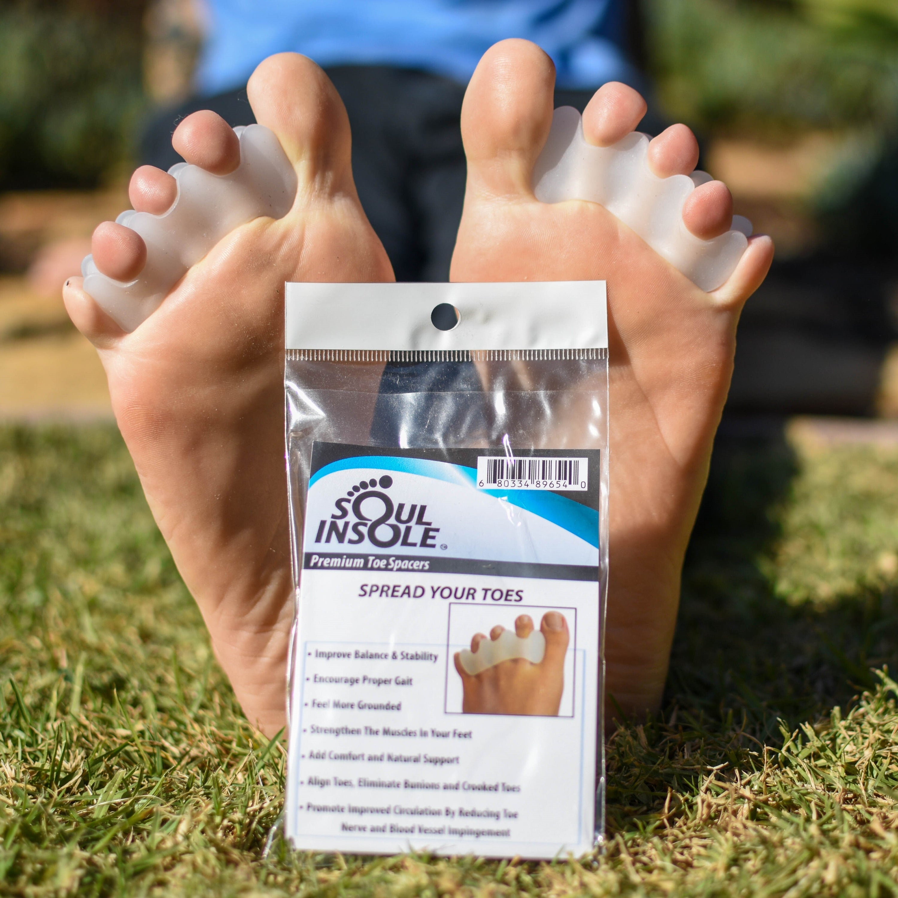 A pair of Premium Toe Spacers made from soft silicone gel, designed for toe alignment and comfort.