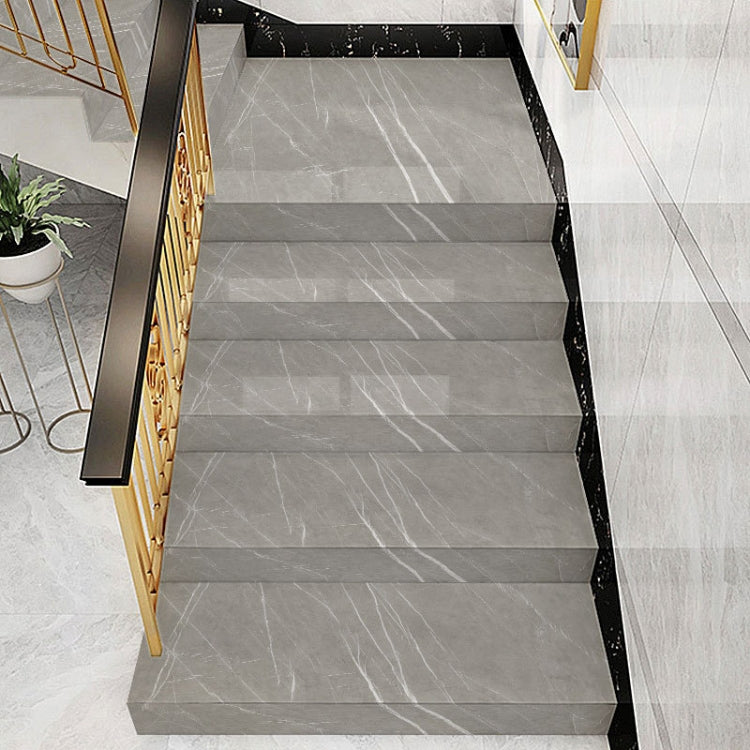 PVC imitation marble stair step anti-slip sticker with a twill pattern, showcasing its self-adhesive backing and high reflectivity.