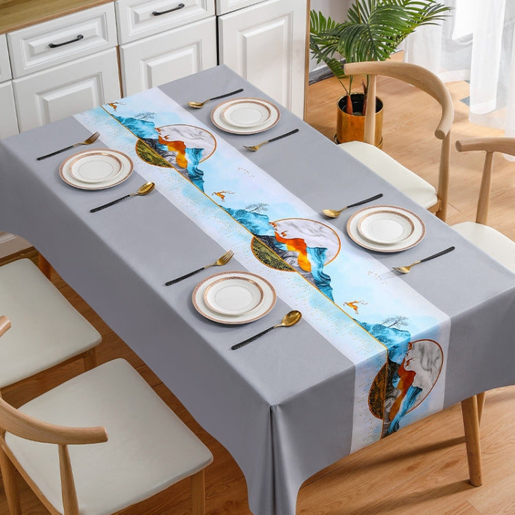 A stylish PVC waterproof oil-proof tablecloth featuring elegant embroidery, perfect for dining tables.