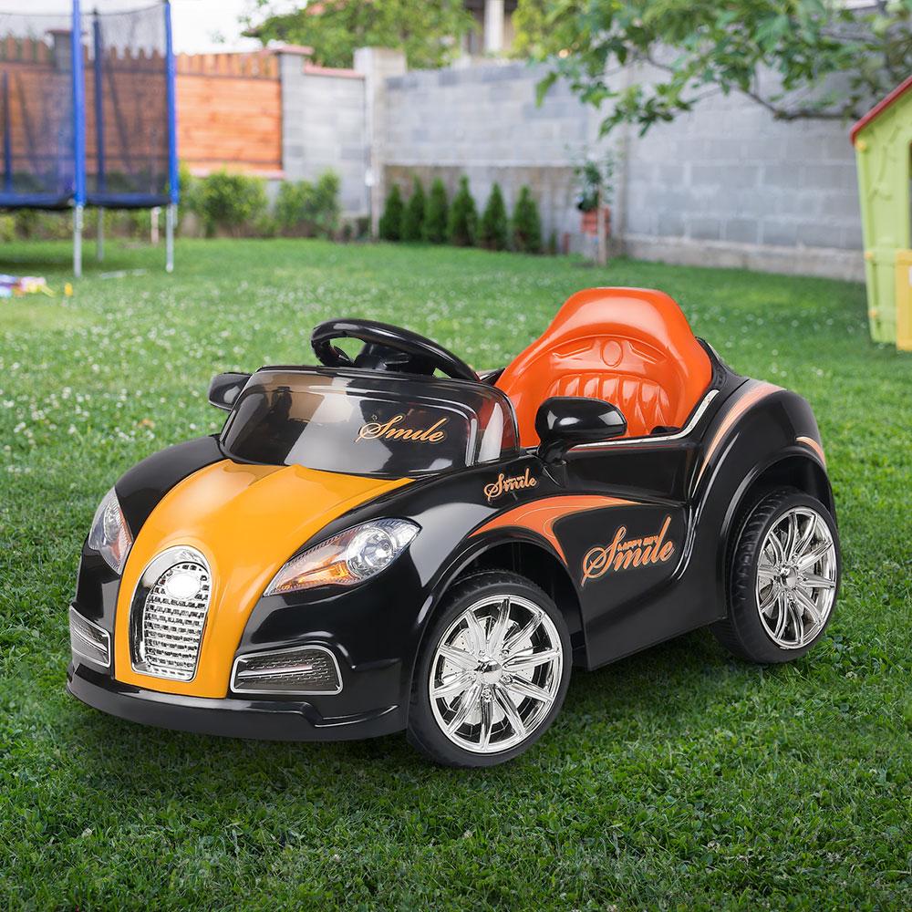 Rigo Kids Ride On Car in Black and Orange, featuring a sleek Bugatti-inspired design with headlights and a spacious seat.