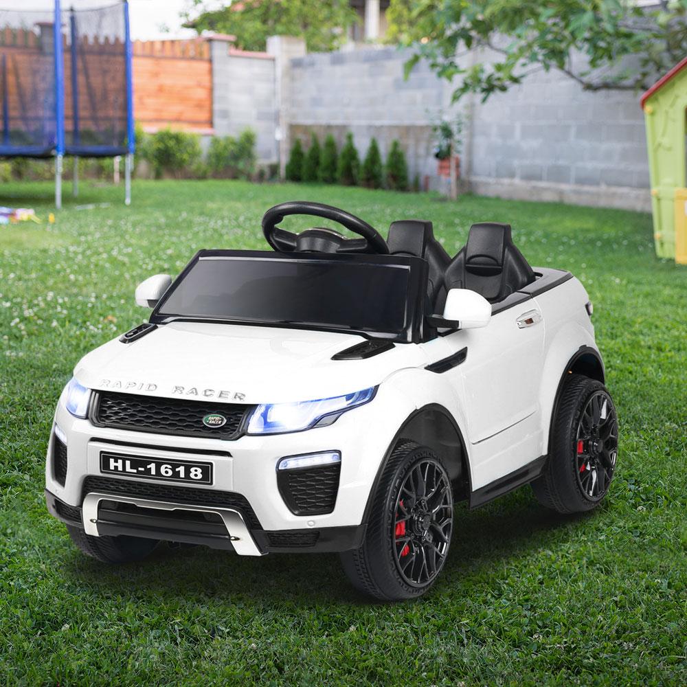 Rigo Kids Ride On Car in white, featuring a sleek design, working doors, and a digital dashboard for a realistic driving experience.