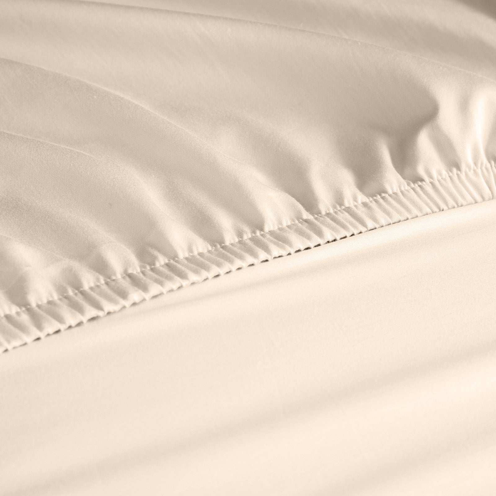 Royal Comfort 1000 Thread Count Fitted Sheet in various colors, showcasing its soft texture and elegant design.