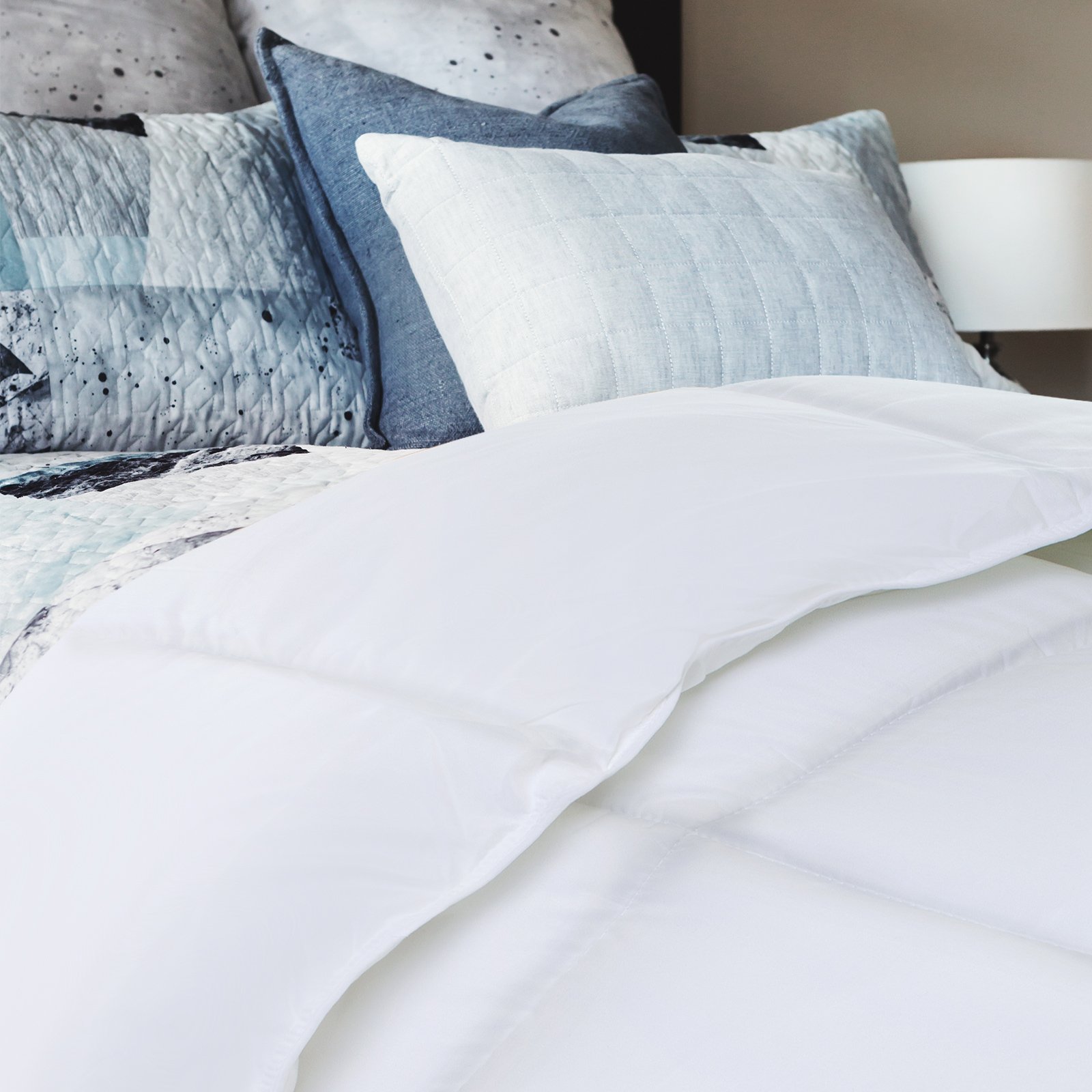 Royal Comfort 800GSM Silk Blend Quilt in white, showcasing its soft texture and luxurious design, perfect for winter warmth.