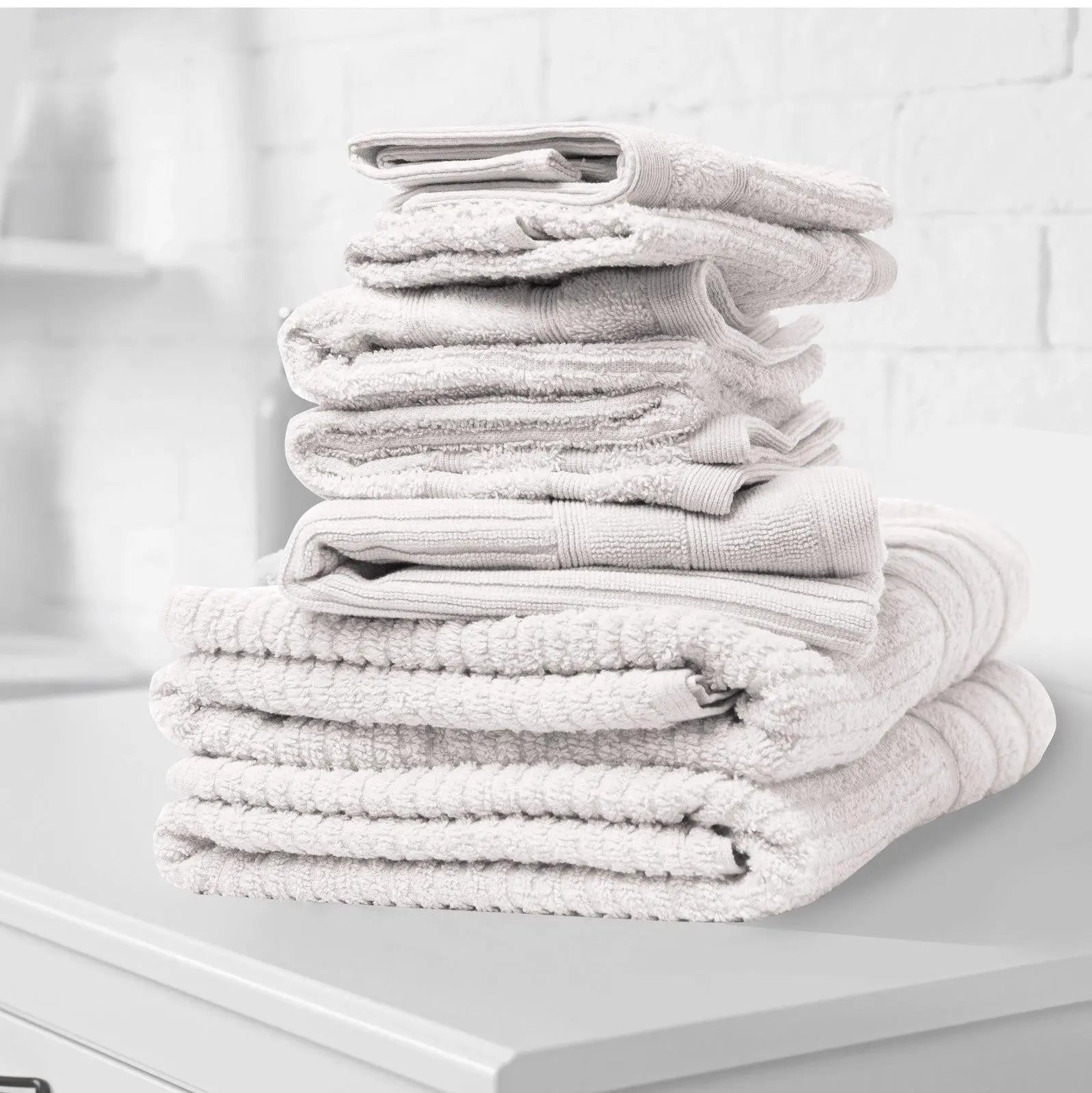 Royal Comfort Eden Egyptian Cotton 600GSM 8 Piece Luxury Bath Towels set featuring various colors and textures, showcasing softness and elegance.