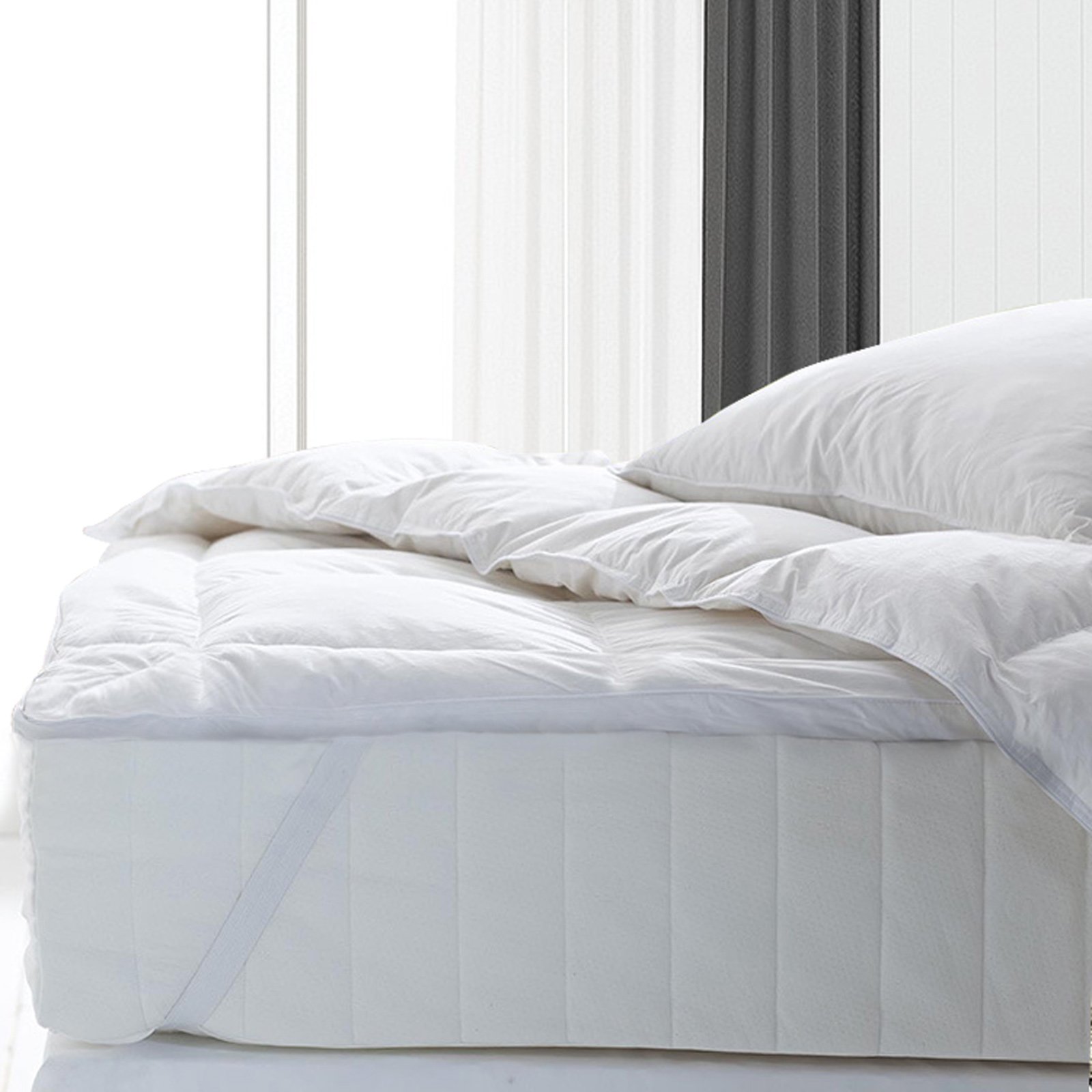 Royal Comfort 1000GSM Goose Mattress Topper featuring plush duck feather fill and soft cotton cover, designed for ultimate comfort.