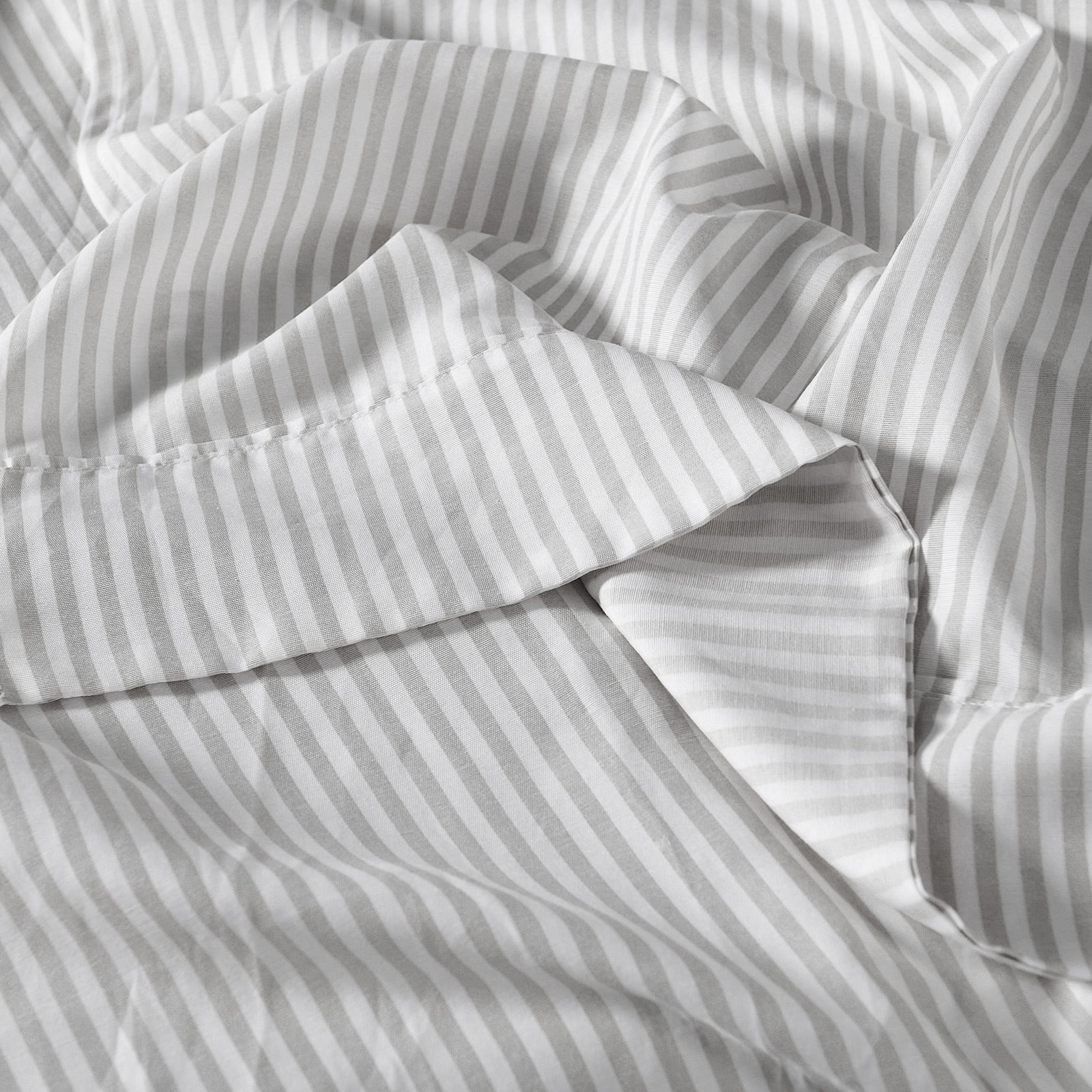 Royal Comfort Stripes Linen Blend Sheet Set featuring neutral stripes, showcasing a luxurious and breathable bedding solution.