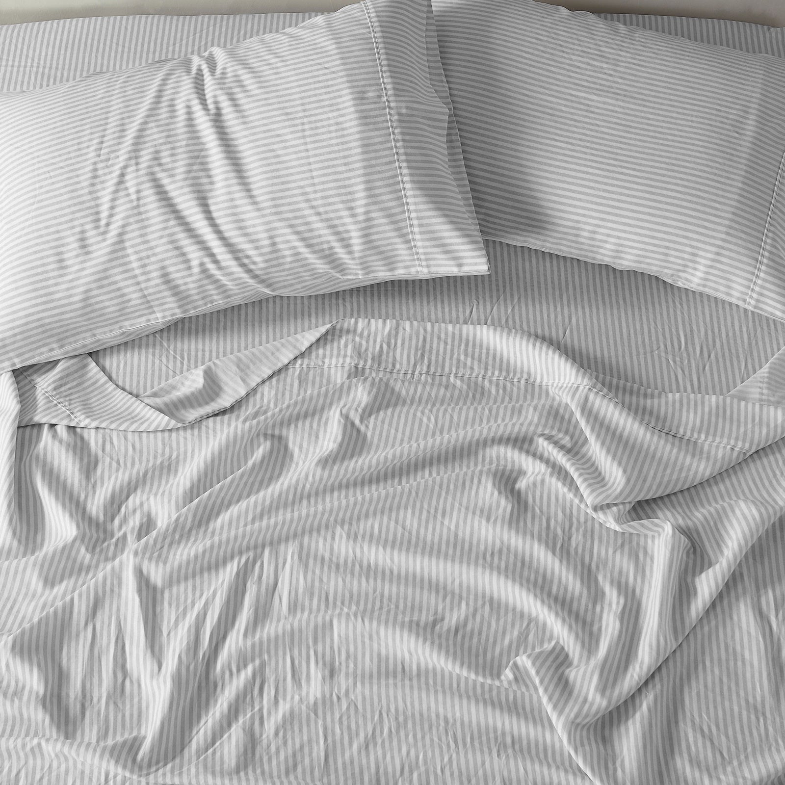 Royal Comfort Stripes Linen Blend Sheet Set featuring neutral stripes, showcasing a luxurious and breathable bedding solution.