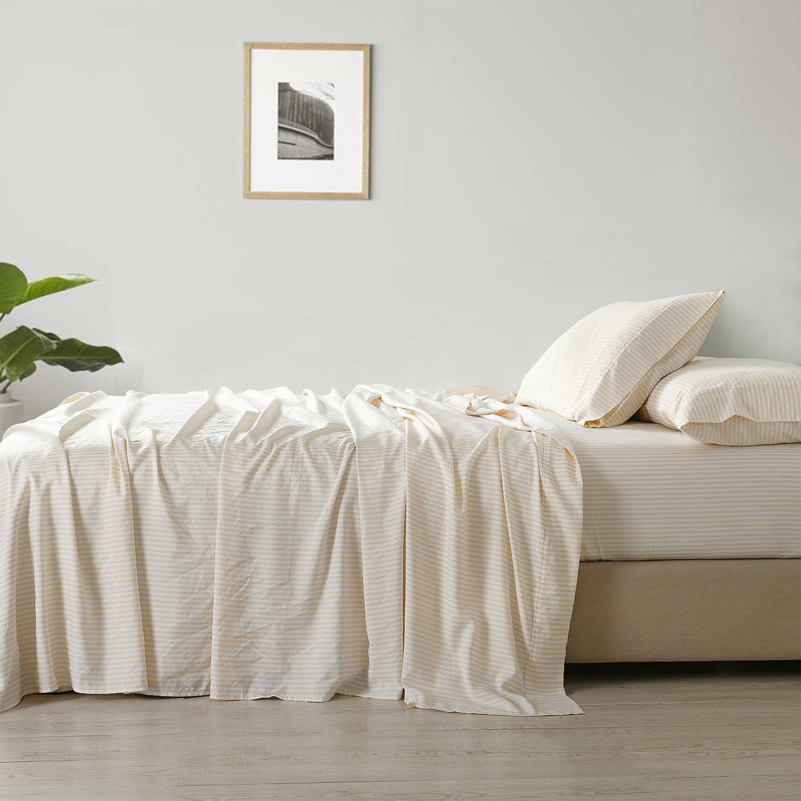 Royal Comfort Stripes Linen Blend Sheet Set featuring a neutral stripe design, showcasing the luxurious texture and breathable fabric.