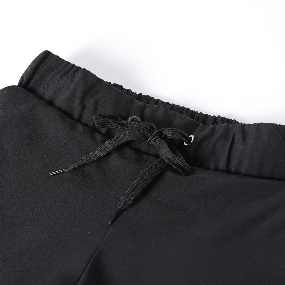 Women's 2 in 1 running shorts featuring an elastic waistband, breathable fabric, and reflective details, perfect for jogging and fitness activities.