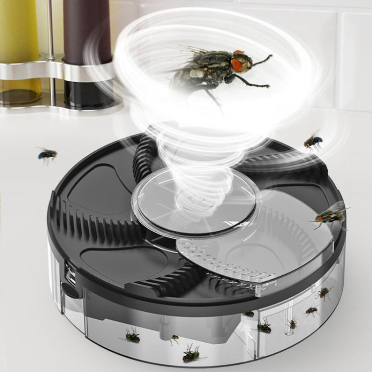 S008 Automatic Fly Killer Silent USB Household Fly Trap in a modern kitchen setting, showcasing its compact design and USB charging feature.