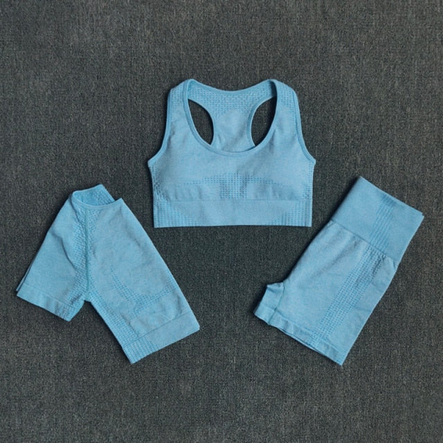 Seamless 3pcs Women Yoga Set featuring a crop top, workout bra, and high-waisted shorts in various colors.