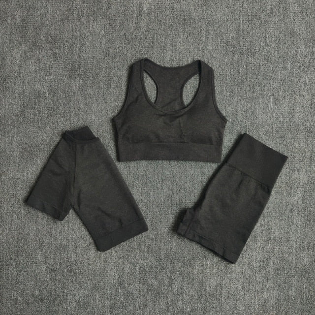 Seamless 3pcs Women Yoga Set featuring a crop top, workout bra, and high-waisted shorts in various colors.