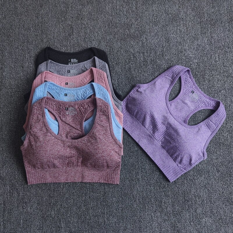 Seamless sports bra top for women in various colors, designed for high-impact workouts and comfort.