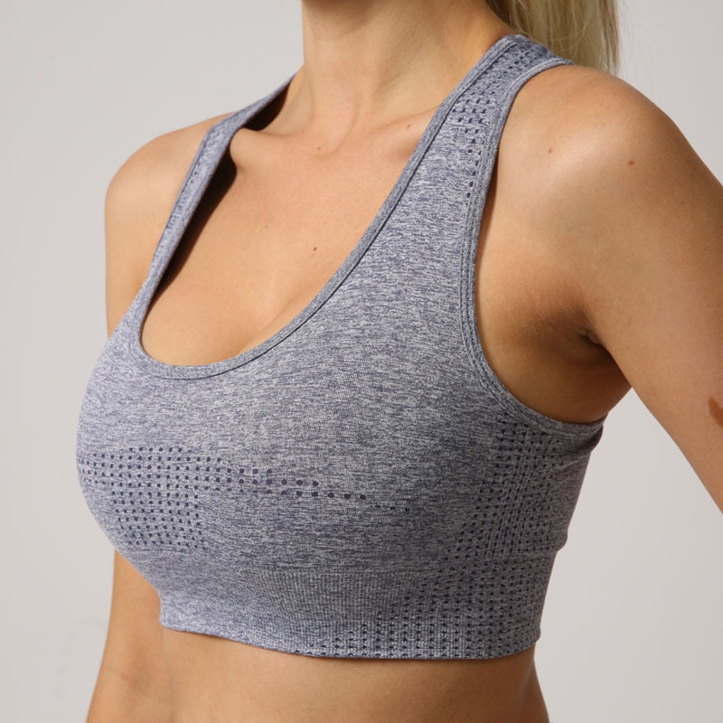 Seamless sports bra top for women in various colors, designed for high-impact workouts and comfort.