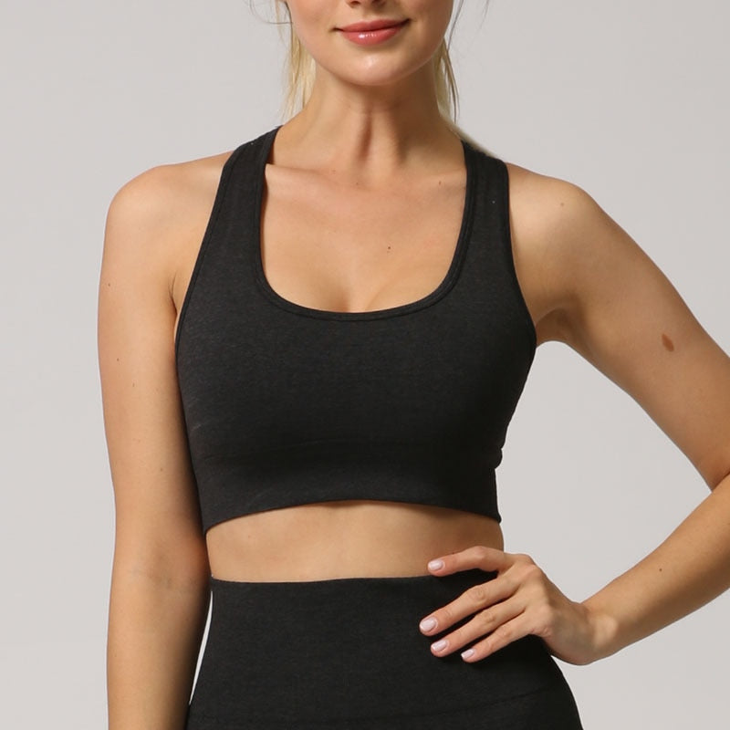 Seamless sports bra top for women in various colors, designed for high-impact workouts and comfort.