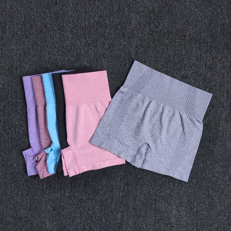 Seamless women's high waist workout shorts in various colors, designed for yoga and fitness activities, showcasing a comfortable and stylish fit.