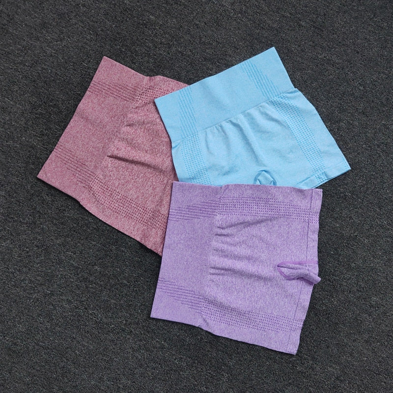 Seamless women's high waist workout shorts in various colors, designed for yoga and fitness activities, showcasing a comfortable and stylish fit.