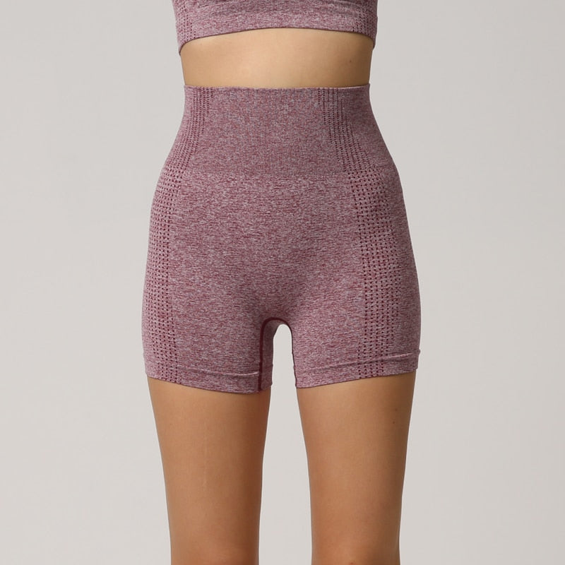 Seamless women's high waist workout shorts in various colors, designed for yoga and fitness activities, showcasing a comfortable and stylish fit.