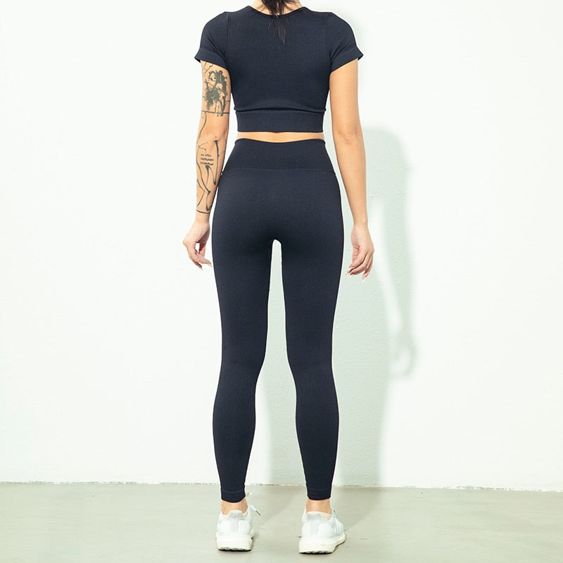 Seamless Zipper Women Yoga Set featuring a stylish crop top and high waist leggings in various colors, perfect for workouts and yoga.