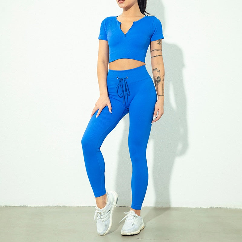 Seamless Zipper Women Yoga Set featuring a stylish crop top and high waist leggings in various colors, perfect for workouts and yoga.