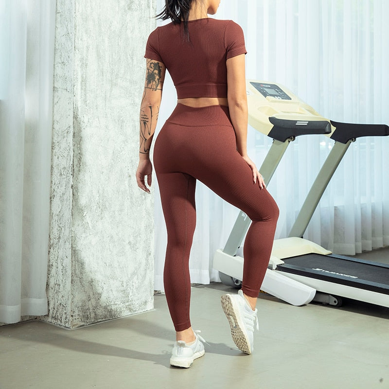 Seamless Zipper Women Yoga Set featuring a stylish crop top and high waist leggings in various colors, perfect for workouts and yoga.