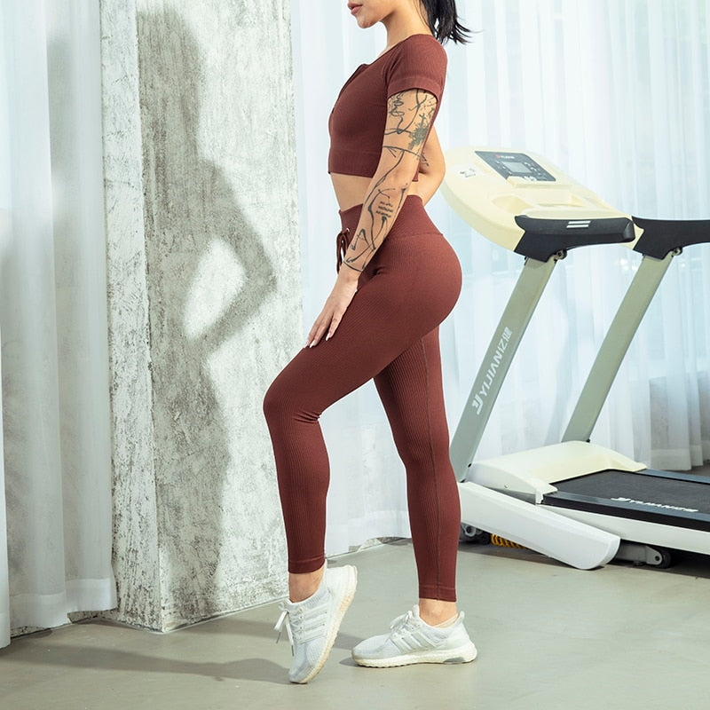 Seamless Zipper Women Yoga Set featuring a stylish crop top and high waist leggings in various colors, perfect for workouts and yoga.