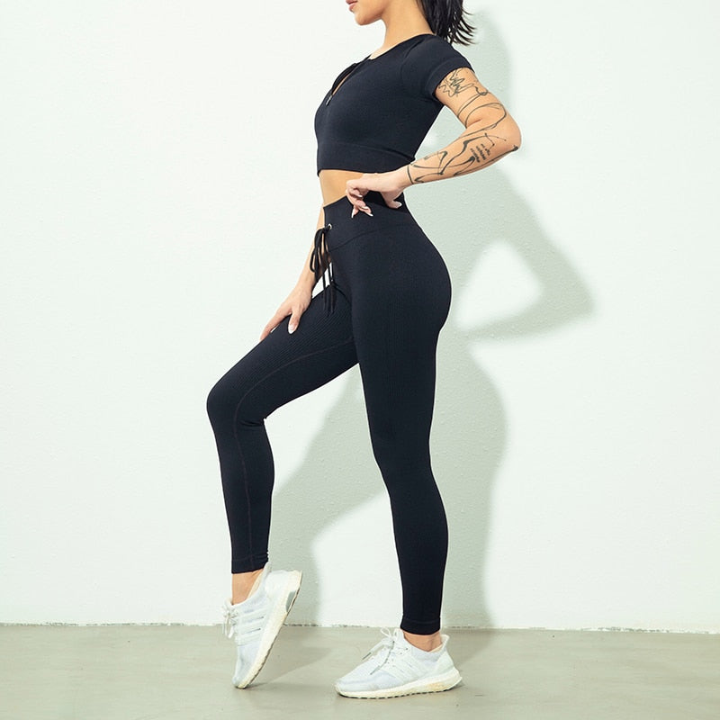 Seamless Zipper Women Yoga Set featuring a stylish crop top and high waist leggings in various colors, perfect for workouts and yoga.