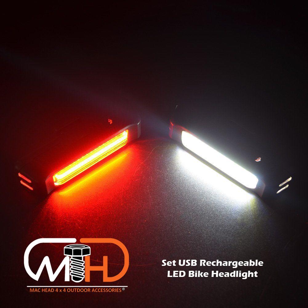 USB rechargeable LED bike light set including front headlight and rear taillight with silicone mounting straps.