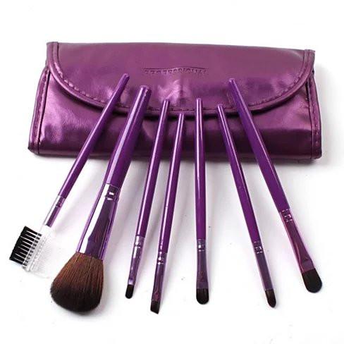 Seven Heaven Best of Beauty Brushes set featuring 7 colorful brushes with wooden handles and nylon bristles in a travel pouch.