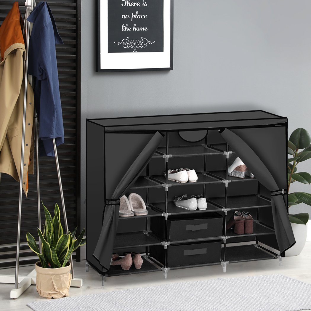 A stylish black DIY portable shoe rack with 15 compartments, made of non-woven fabric and a sturdy metal frame, showcasing organized footwear.