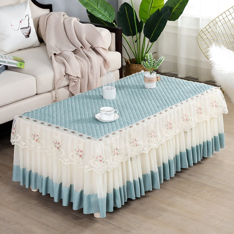 Simple Fabric Lace Rectangular Tablecloth in peach skin, made of crystal velvet, elegantly draped over a dining table.