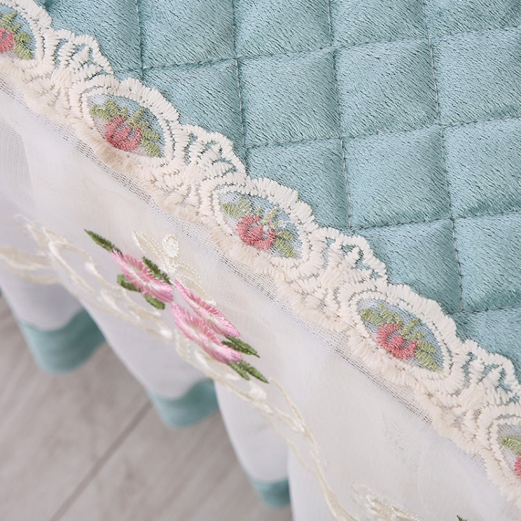 Simple Fabric Lace Rectangular Tablecloth in peach skin, made of crystal velvet, elegantly draped over a dining table.