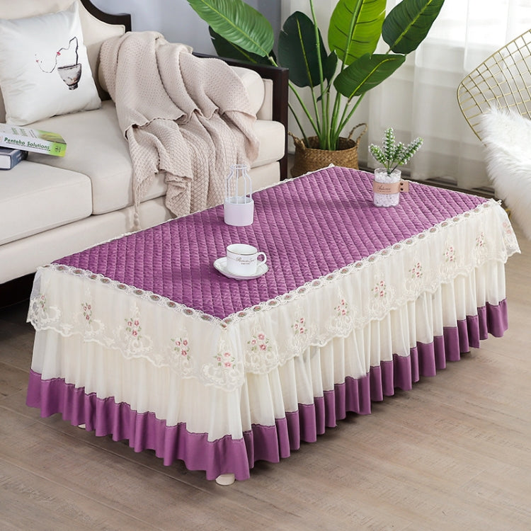 Simple Fabric Lace Rectangular Tablecloth in peach skin color, made of crystal velvet, elegantly draped over a table.