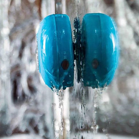 A vibrant Bluetooth speaker designed for use in the shower, featuring a waterproof silicone exterior and built-in microphone for hands-free calls.