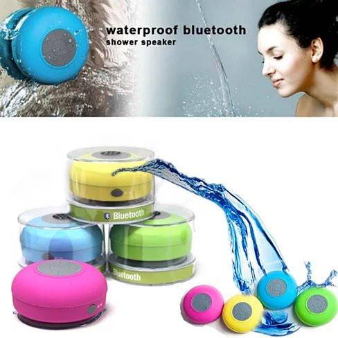 A vibrant Bluetooth speaker designed for use in the shower, featuring a waterproof silicone exterior and built-in microphone for hands-free calls.